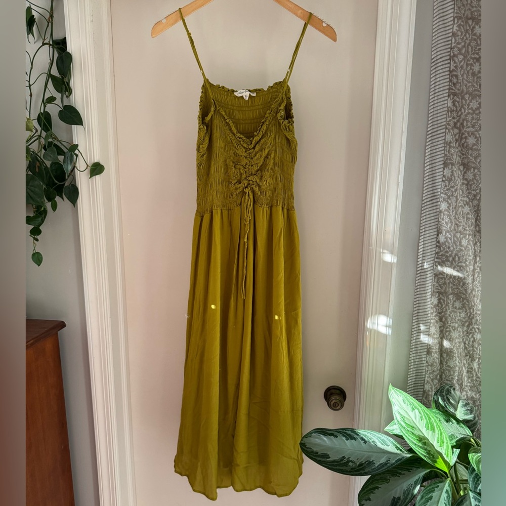 Flowy midi dress sold at Anthropologie